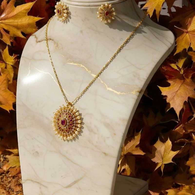 20260109_000223_0004 South Indian locket set with traditional gold design and red stone detailing